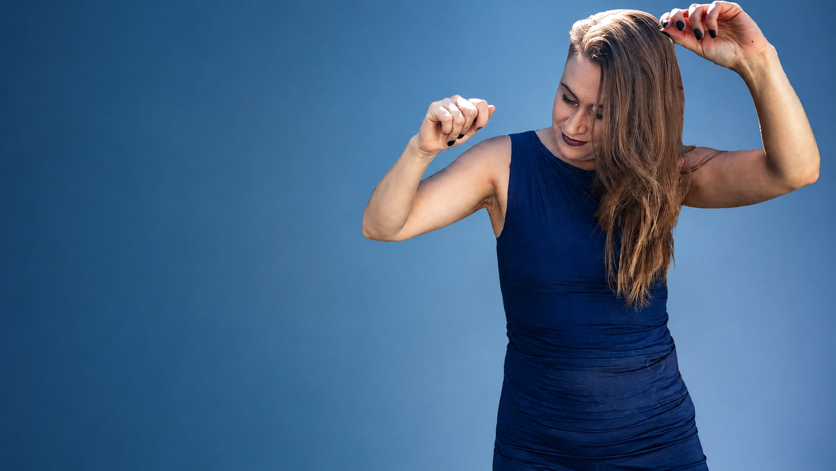 Angela McMillan, movement specialist and embodiment business coach, mid-movement